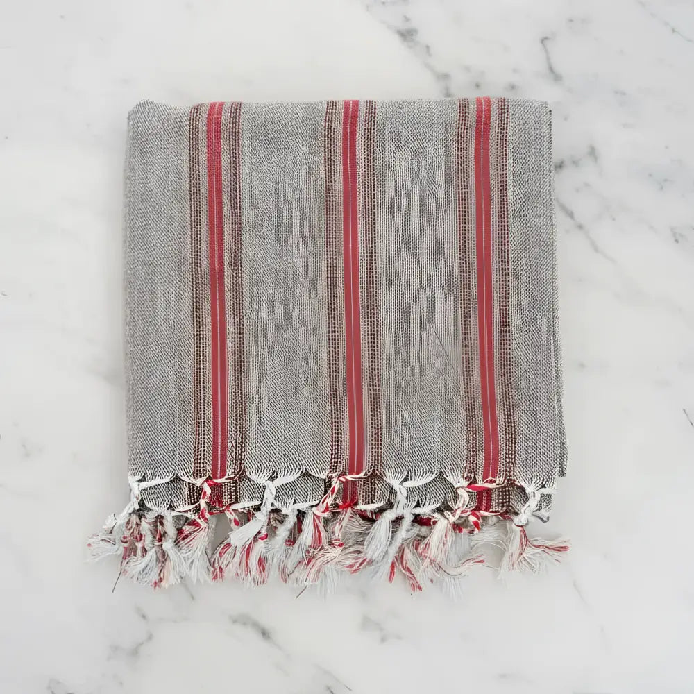 Gray linen turkish hand towel with bold red vertical stripes and fringed edges premium cotton hand towels