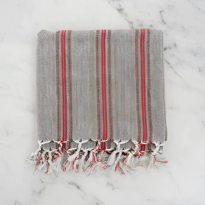 Gray linen turkish hand towel with bold red vertical stripes and fringed edges premium cotton hand towels