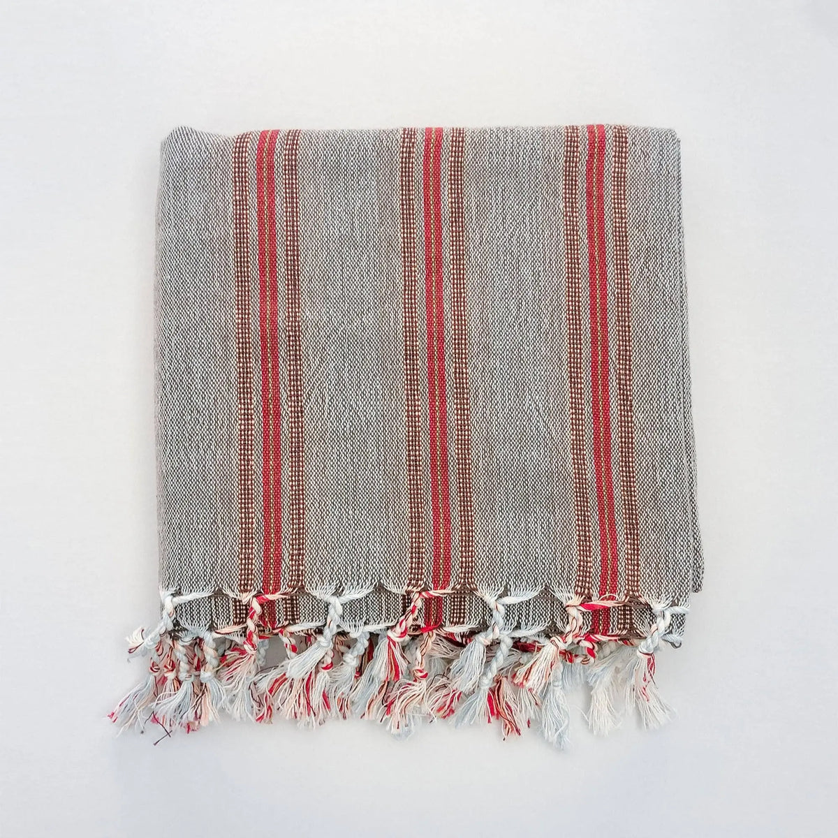 Gray and red striped Turkish towel with tassels, handcrafted Turkish cotton for an ethically sourced turkish bath