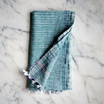 Rustic organic cotton handloomed towel in teal white stripes with frayed edges