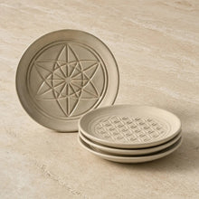 Beige ceramic sacred designs appetizer plates with unique embossed patterns and geometric texture
