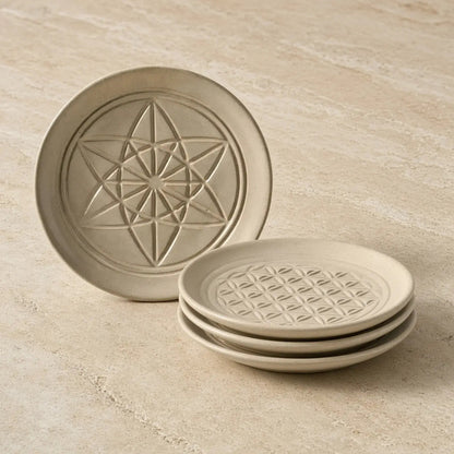 Beige ceramic sacred designs appetizer plates with unique embossed patterns and geometric texture