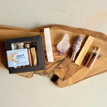 A black rectangular box labeled the gardener’s wife sacred space with natural palo santo stick and sage for creating intentional space celestial ritual kit