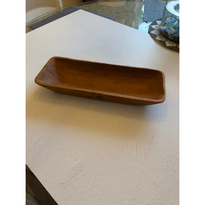 Rectangular salvaged teak root hand carved wooden oblong bowl with smooth warm brown finish perfect for bread bowls