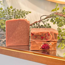 Sandalwood Rose Soap Bar is made with raw shea butter, organic olive oil, organic coconut oil, organic castor oil, sandalwood powder, kaolin clay, French pink clay, and a blend of sandalwood; rose essential oils, topped with homegrown rose buds and/or rose petals.
