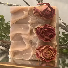 Sandalwood Rose Soap Bar is made with raw shea butter, organic olive oil, organic coconut oil, organic castor oil, sandalwood powder, kaolin clay, French pink clay, and a blend of sandalwood; rose essential oils, topped with homegrown rose buds and/or rose petals.