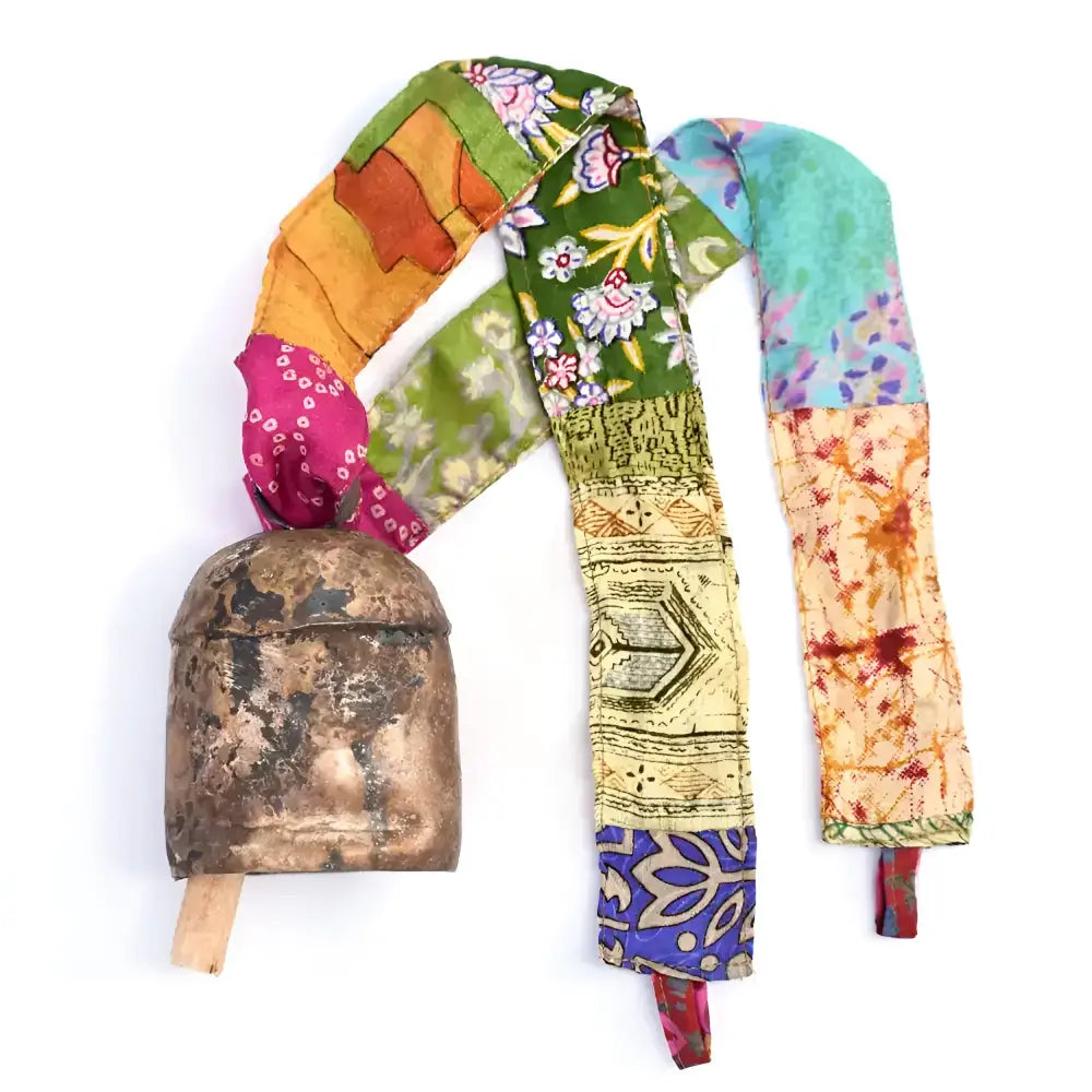 copper bell with colorful sari ribbon