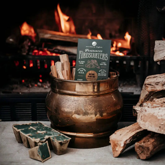 Firestarters Evergreen Forest in a copper bucket in front of a fire