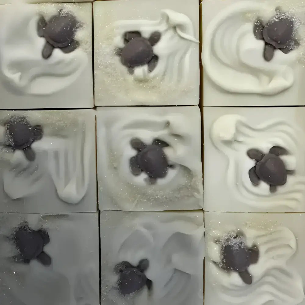Nine sea turtle French lavender bar soap tiles with glittery details and light bases