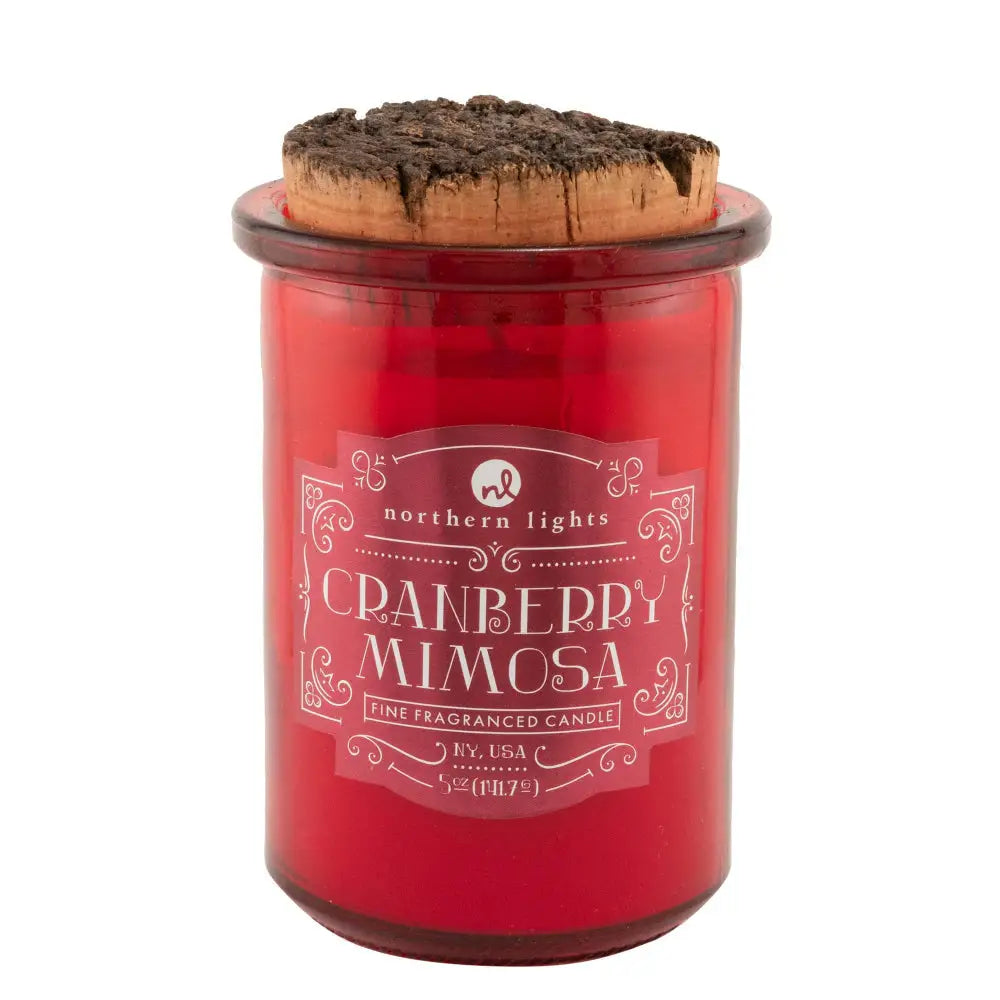 Red jar candle with cork lid from Seasonal Spirit Candles inspired by favorite holiday cocktails for a festive mood