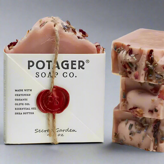 Pink artisanal soap bars with dried flower petals from Secret Garden Soap by Potagers Secret