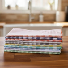 Stack of 8 handmade seersucker cloth napkins in pastel stripes