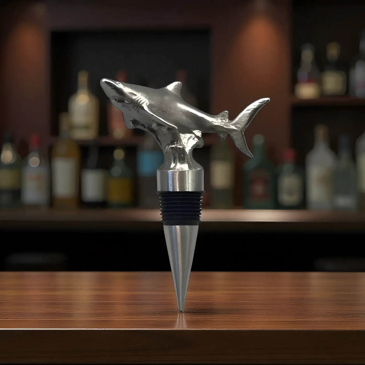 Silver handcrafted pewter shark stopper with metallic finish and black rubber seal adds quirky touch to wine bottles