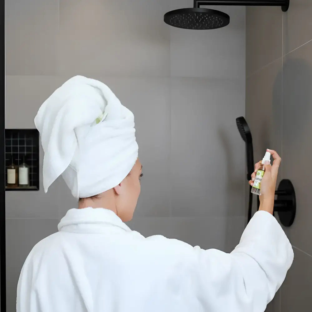 White spray bottle of lavender meadow essential oil shower mist, longer lasting