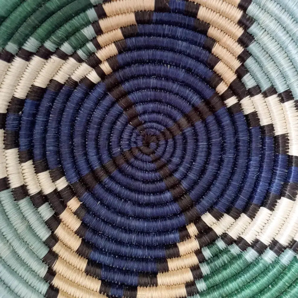 Small star sisal bowl handwoven african basket with navy blue black beige green fibers and a hanging loop small size