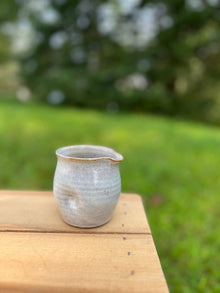 Handcrafted thumb divot pitcher 8 oz with matte gray glaze