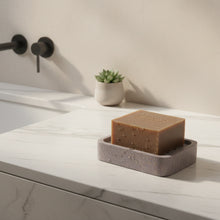 Brown soap bar in handmade eco-friendly Soapstone Big Hole soap dish