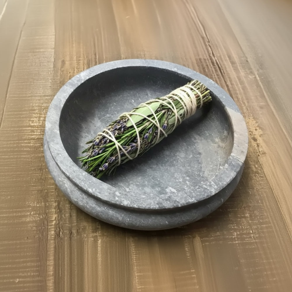 Handmade eco-friendly soapstone bowl with gray smooth worn surface