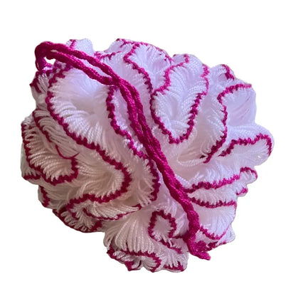 Soft white and pink organic cotton bath pouf with textured loops