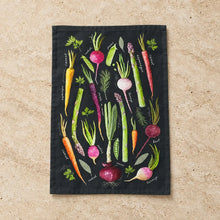 Black spring veggies tea towel with vibrant carrot radish asparagus print made of premium cotton for kitchen use