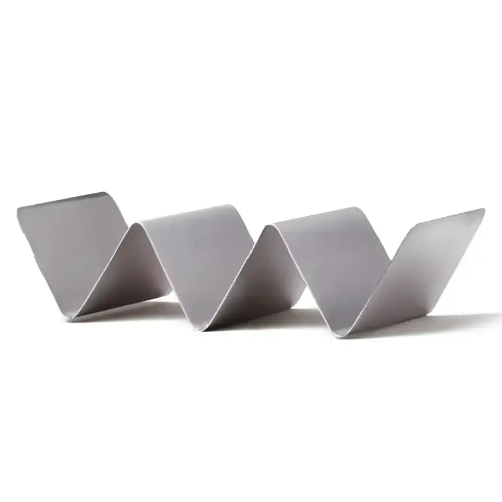 Silver-colored steel upright taco rack with three slots for serving tacos