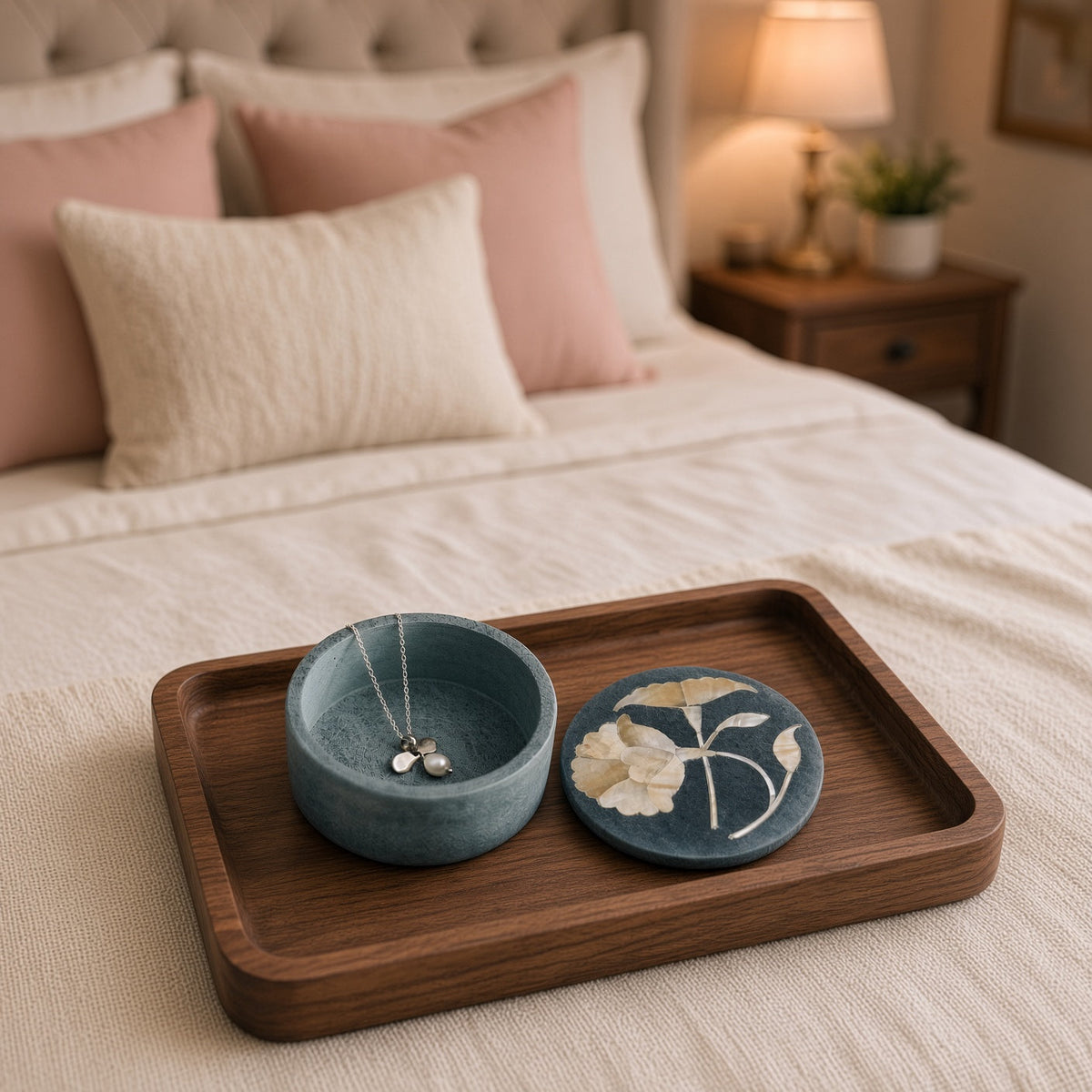 Matte blue ceramic bloom box with palewa stone floral inlay and matching lid on dark wood tray by tara projects