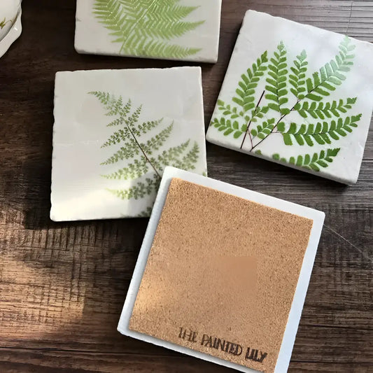 back side of stone coaster with fern design