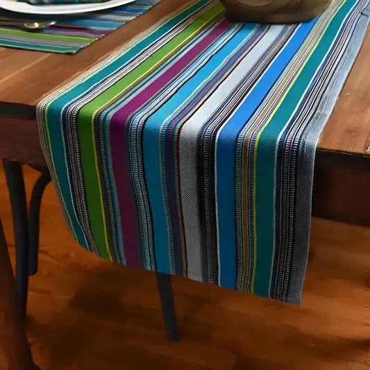 Striped Hand Woven Cotton Table  Runner on a brown wood surface