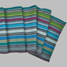 Striped handwoven cotton table runner with vibrant teal, blue, green, and burgundy stripes
