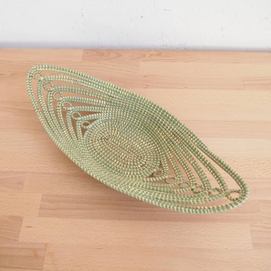 Green and beige woven grass sweetgrass African bread basket made with swamp grass
