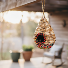 Handwoven teardrop sari birdhouse with recycled cotton trim