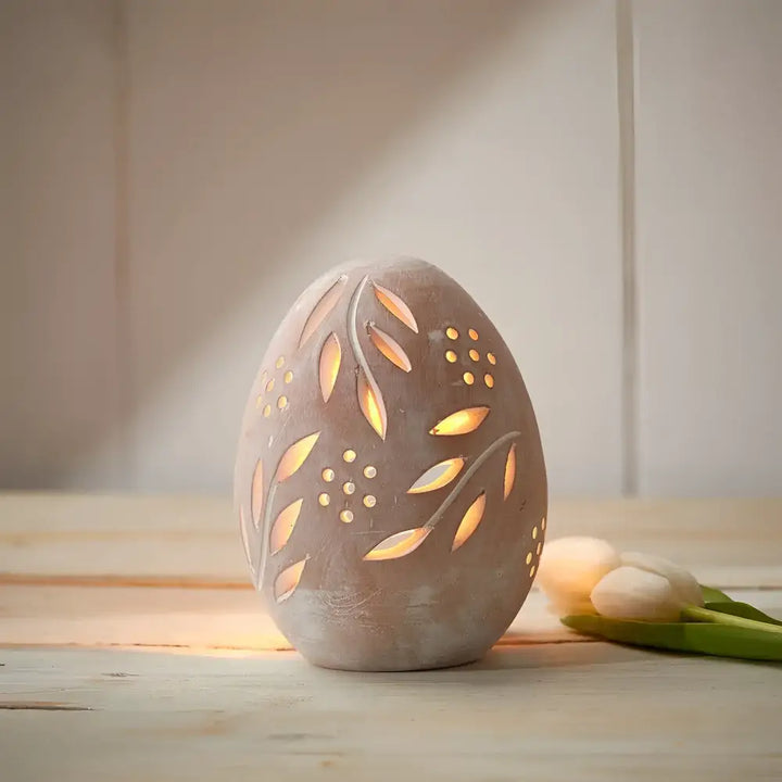 Illuminated decorative Easter egg in Terra Cotta Leaf Egg Lantern, perfect terra egg decor