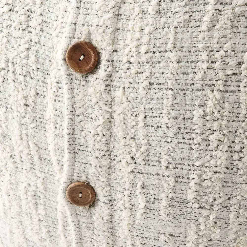 Off white and gray textured hand woven 20 inch x 20 inch pillow cover with three brown coconut buttons on one side 