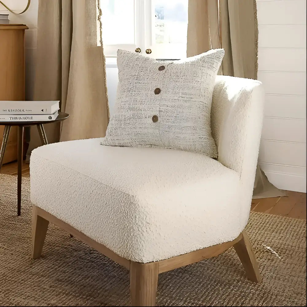 Off white and gray textured hand woven 20 inch x 20 inch pillow cover with three brown coconut buttons on one side 