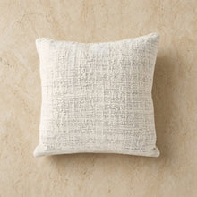 Off white textured cotton pillow with a woven fabric surface perfect as a cotton pillow cover or throw pillow