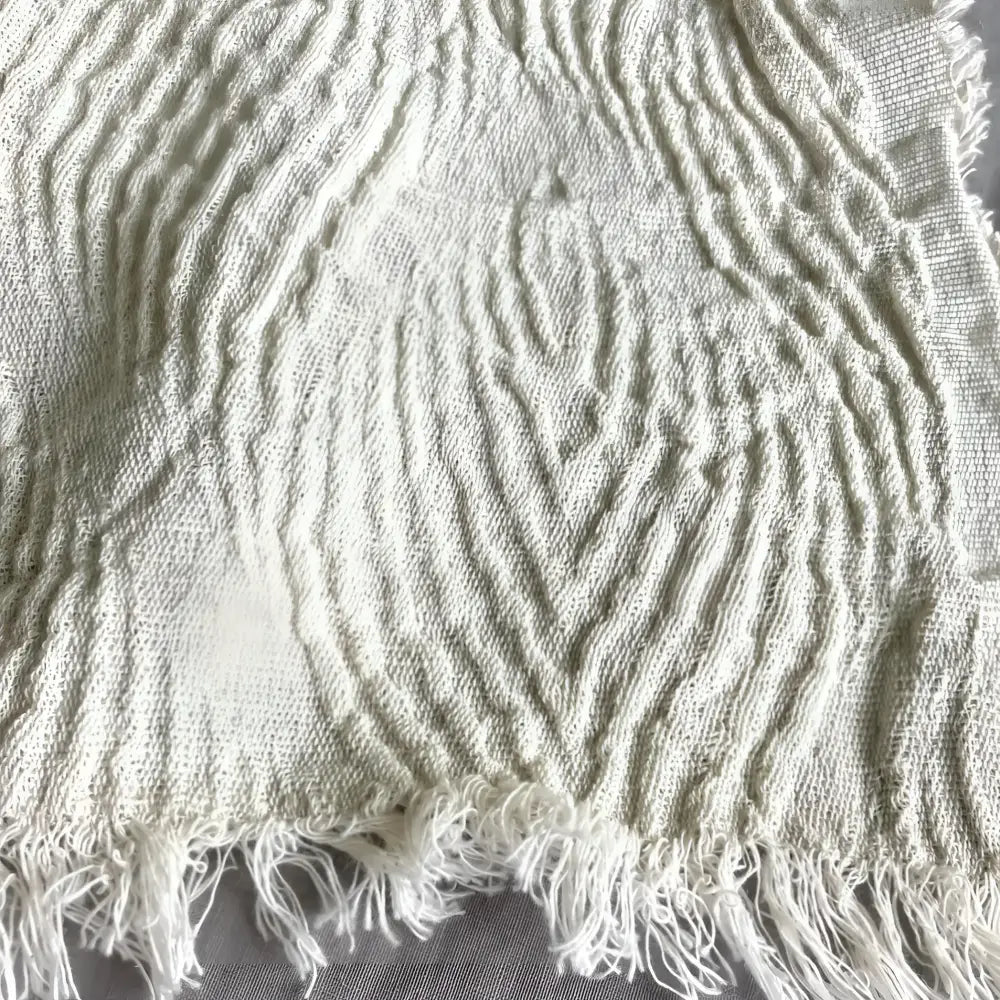 Oatmeal linen fabric with a swirl design