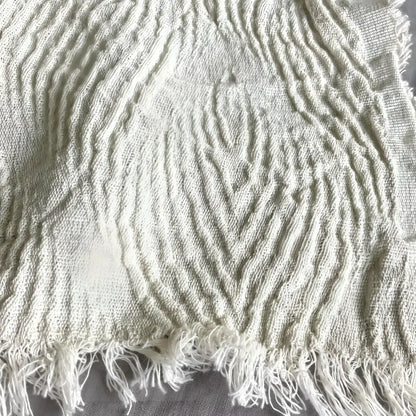 Oatmeal linen fabric with a swirl design