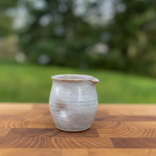 Handcrafted thumb divot pitcher 8 oz with matte gray glaze