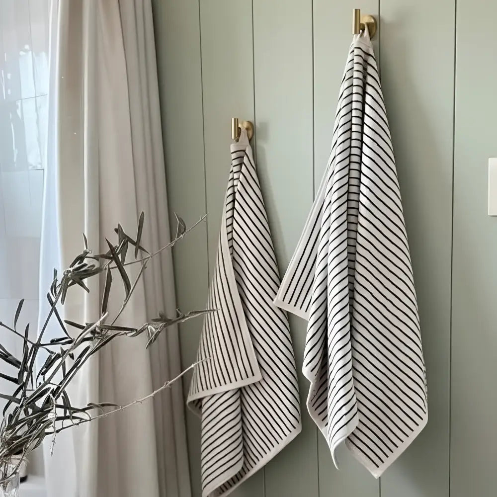 Melika Turkish cotton striped towel in black stripes on cream, spa-like hang