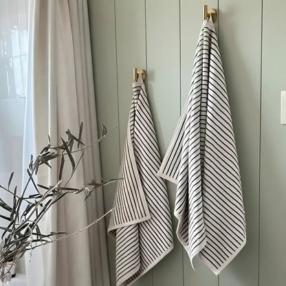 Melika Turkish cotton striped towel in black stripes on cream, spa-like hang