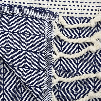 Turkish hand towel with diamond and dotted woven designs in navy blue.