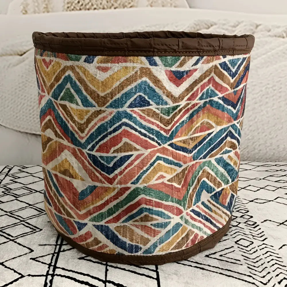 Soft basket created from Turkish rug remnants in colorful geometric design.