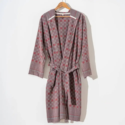 100% cotton robe with a flat woven Turkish towel texture and a hood in a checkered brick color.