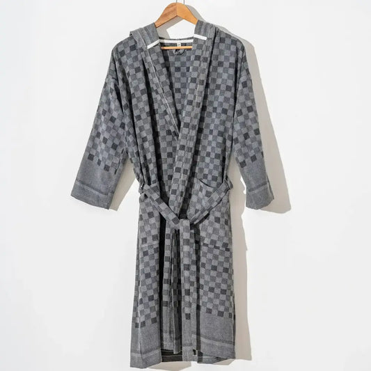 100% cotton robe with a flat woven Turkish towel texture and a hood in a checkered gray and black color.