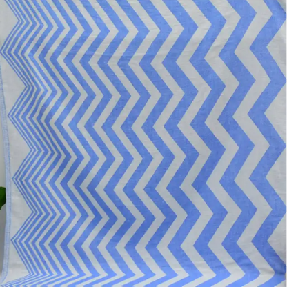 Turkish towel with a zigzag design in pale sax blue features a textured weave perfect for beach or bath use