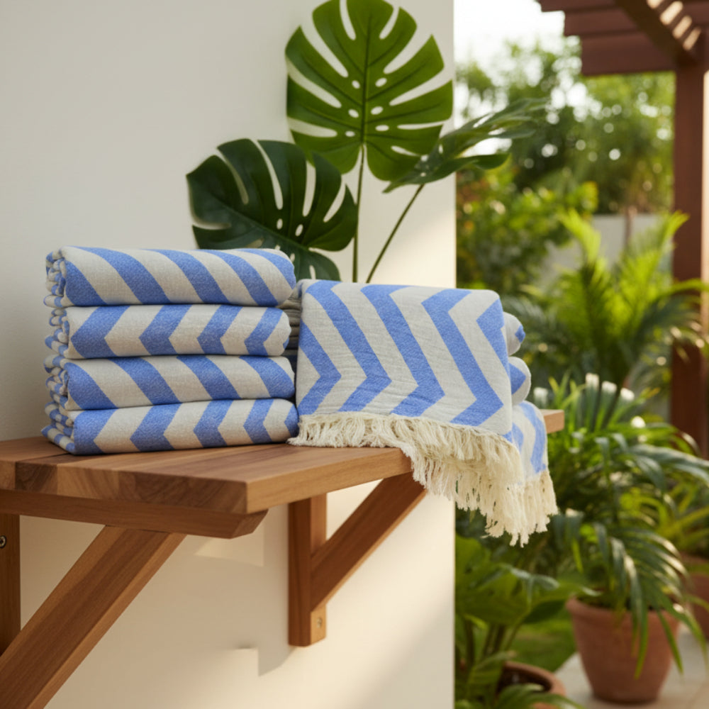 Turkish towel with blue and white zigzag design pale sax blue cotton fabric and fringed edge perfect for beach use