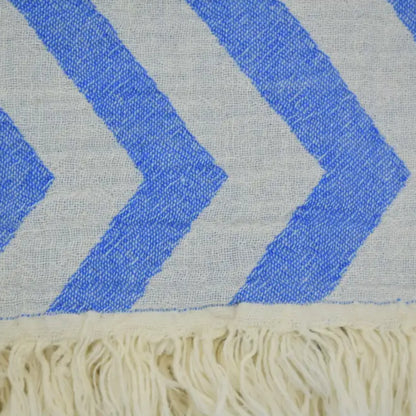 Turkish towel with zigzag design pale sax blue chevron pattern and cream-colored fringe for stylish use
