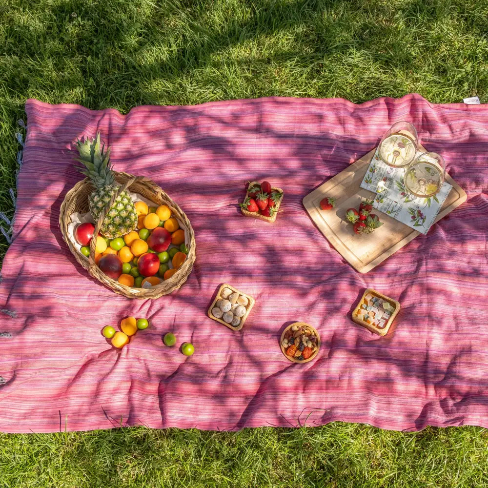 Striped multicolor Turkish beach towels with tassel fringe.