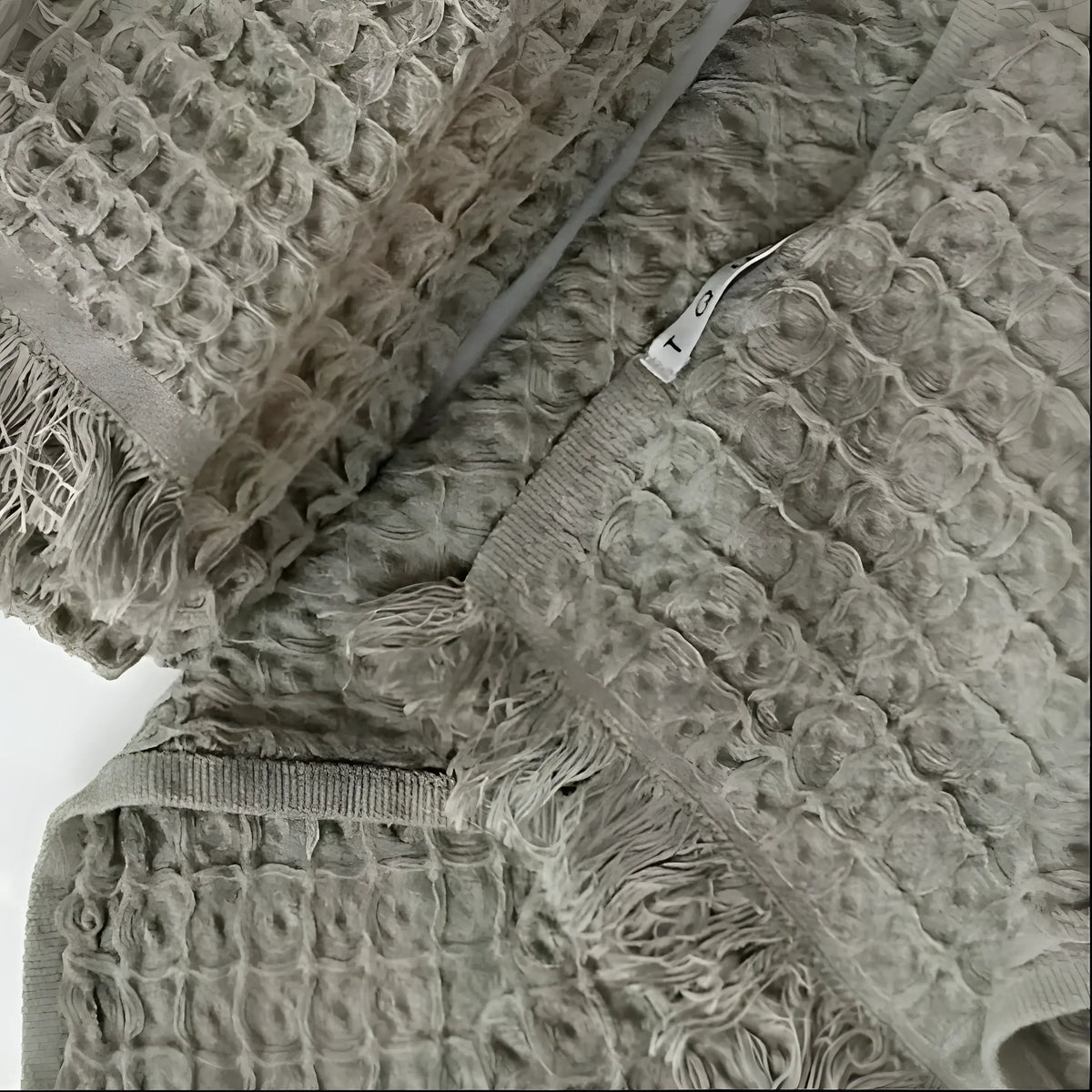 Soft Turkish towel made from pure Aegean cotton with textured waffle weave and fringed edges
