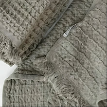 Soft Turkish towel made from pure Aegean cotton with textured waffle weave and fringed edges